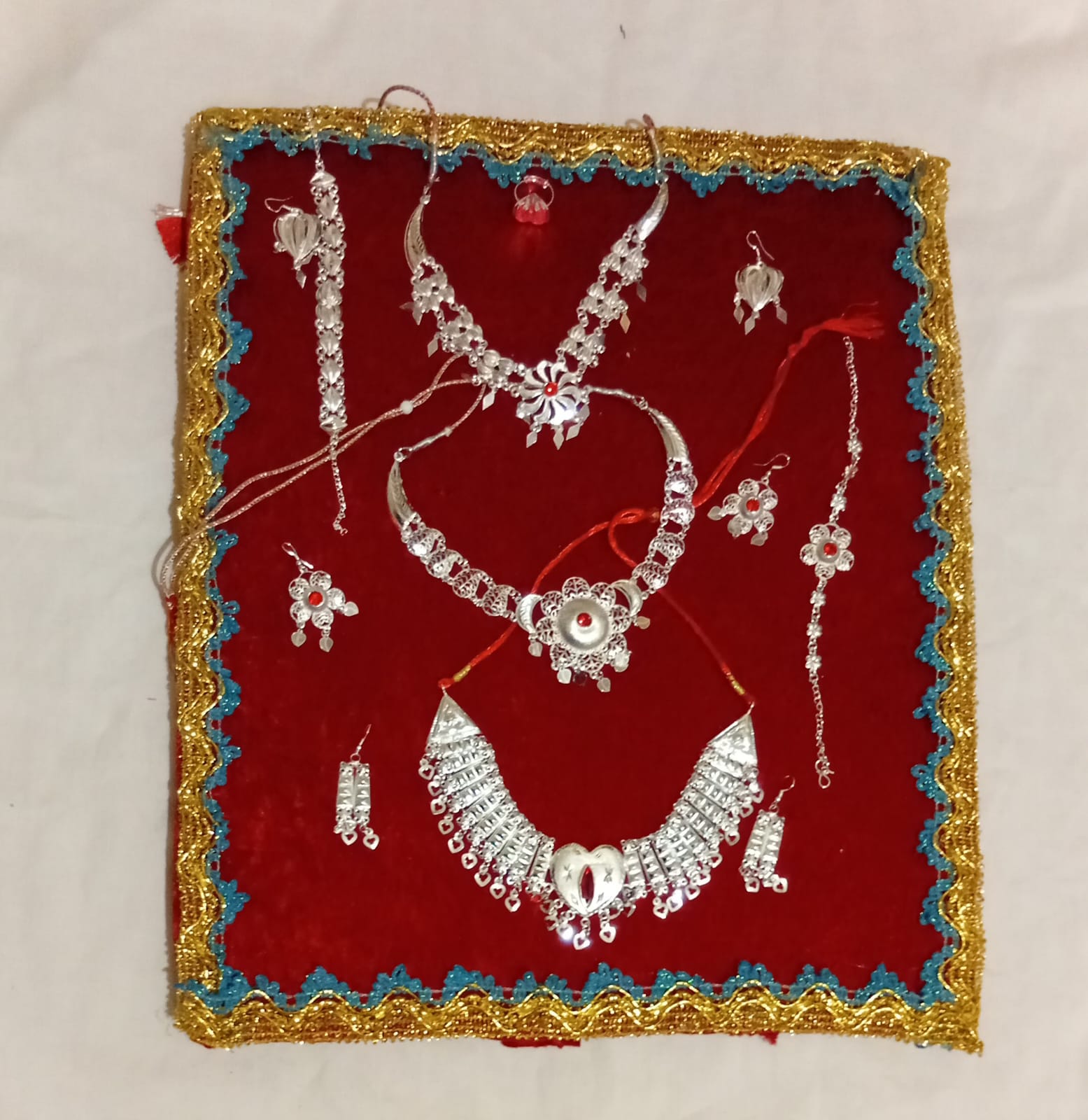 Ensemble de bijoux en argent +cadre